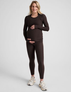 brown long sleeve crew neckline maternity top with thumb holes.