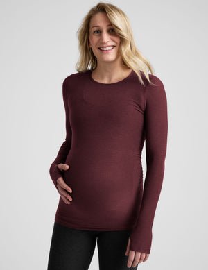 red maternity long sleeve crew neck top.