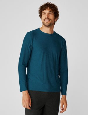 blue men's long sleeve crew neck top.