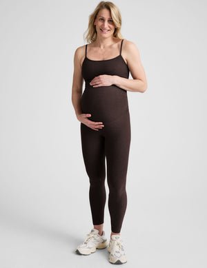 brown maternity midi length tank jumpsuit with adjustable straps.